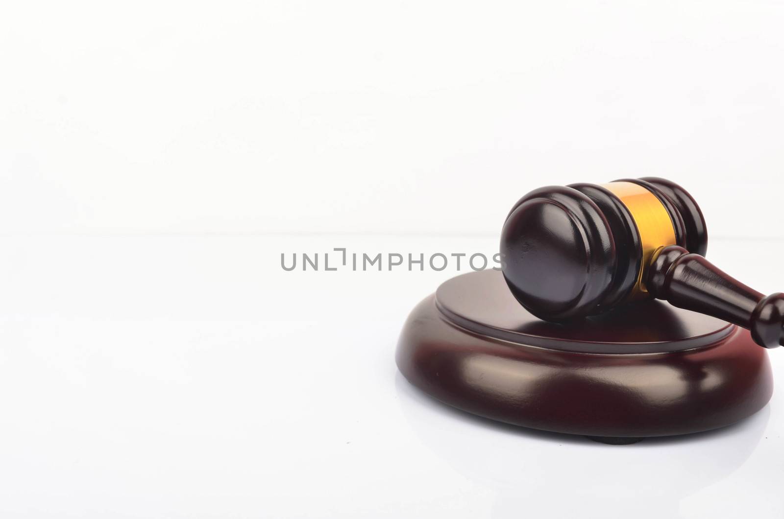 View of a judge hammer or gavel on white background. Law and jurisdiction concept.