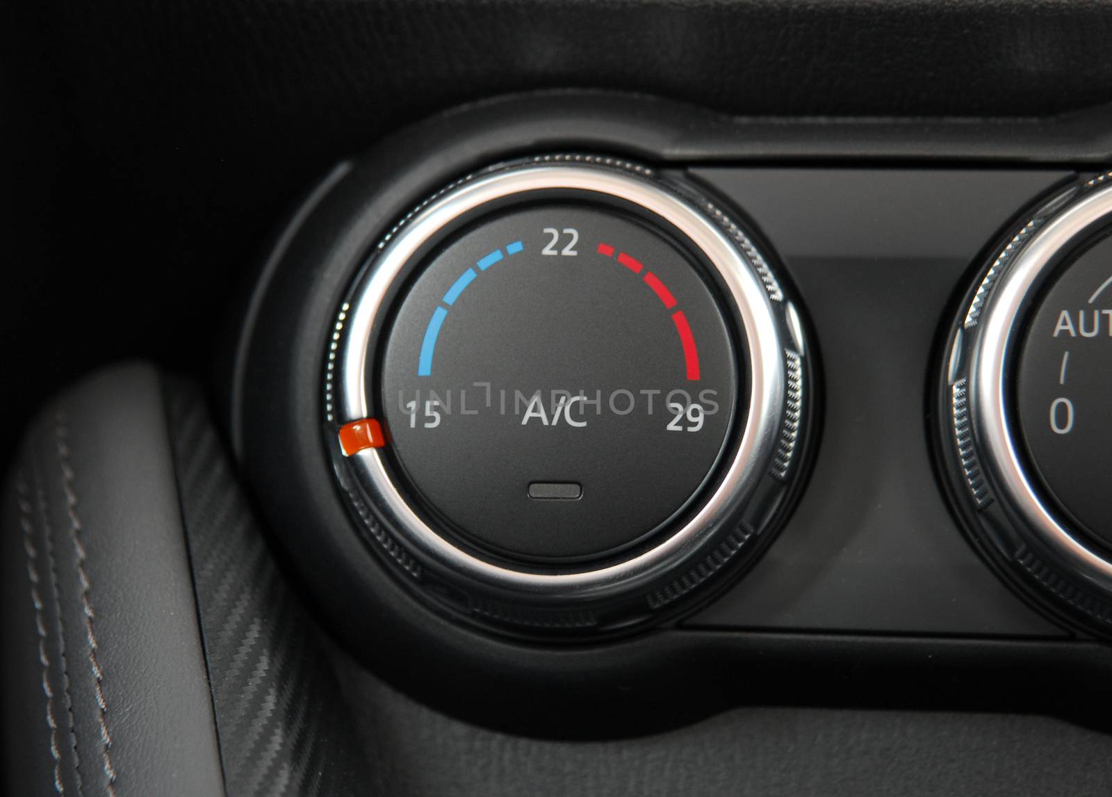 manual switches the air conditioning on the dashboard of the car