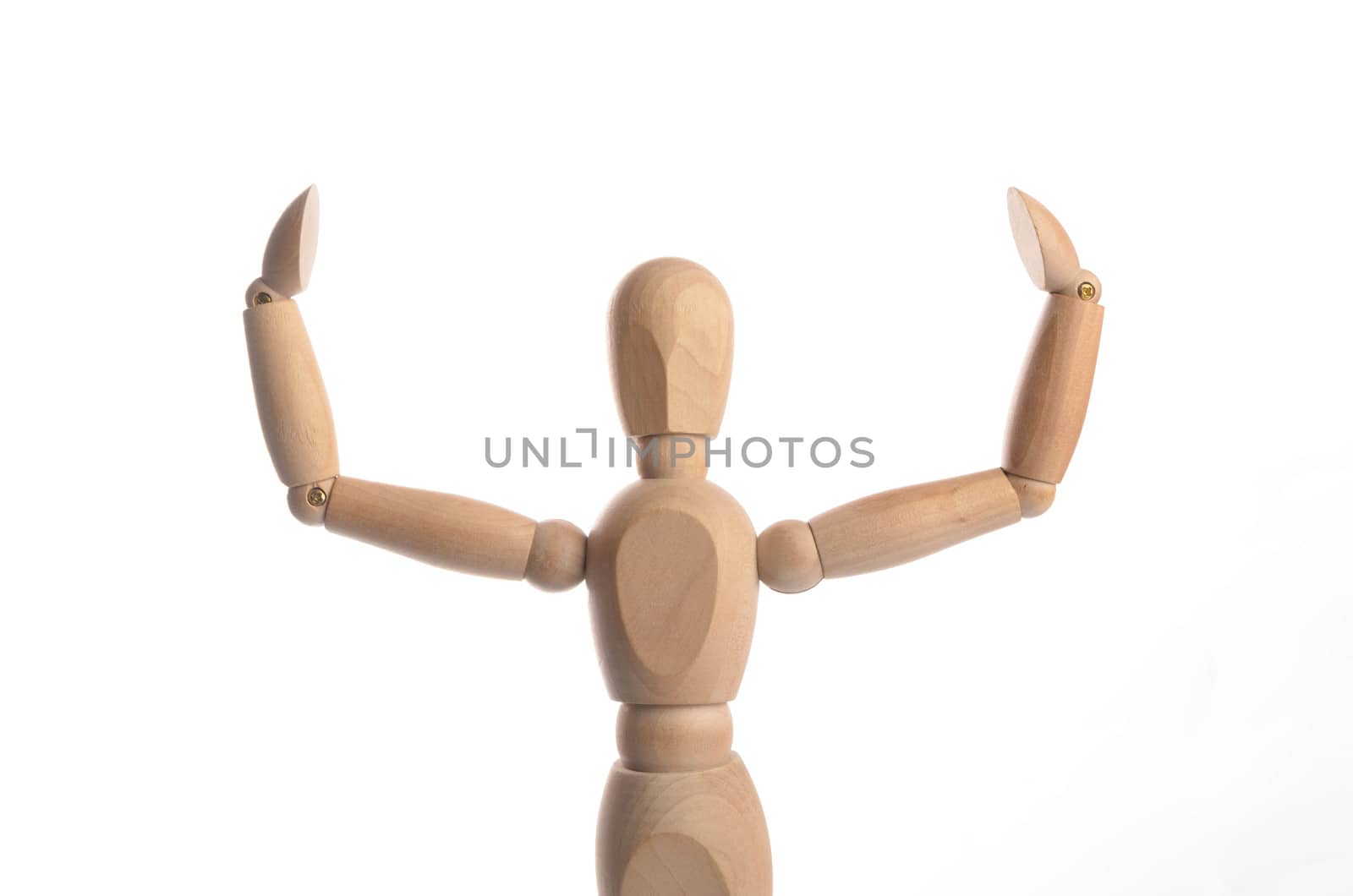 Wooden figure mannequin posing in action isolated on white background.