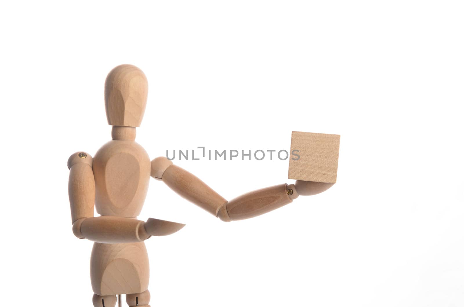 Wooden figure mannequin posing in action isolated on white background.