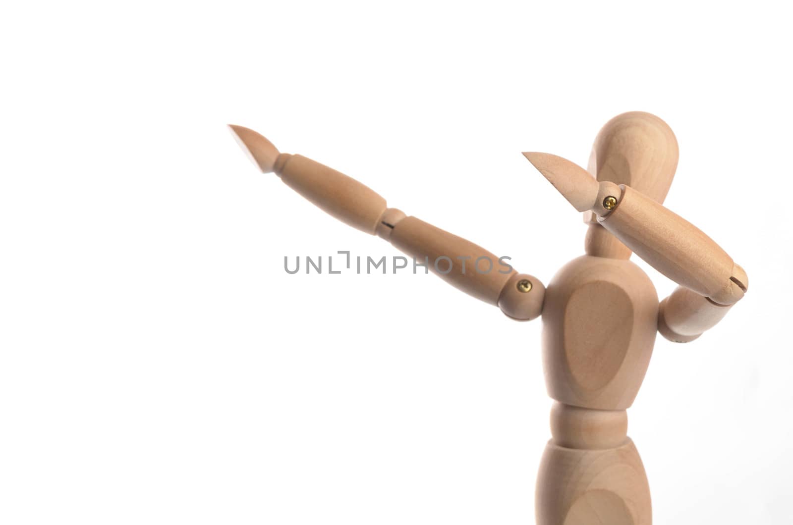 Wooden figure mannequin posing in action isolated on white background.