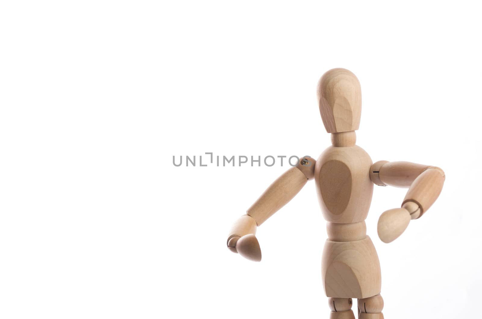 Wooden figure mannequin posing in action isolated on white background.