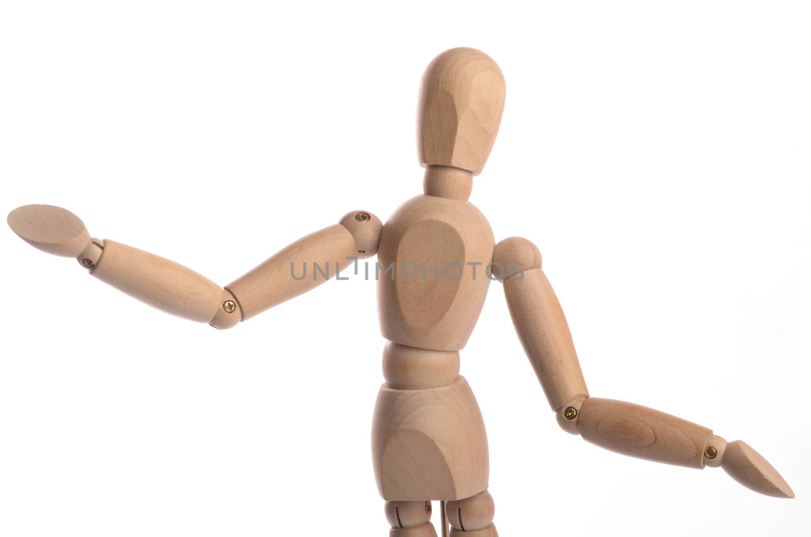 Wooden figure mannequin posing in action isolated on white background.