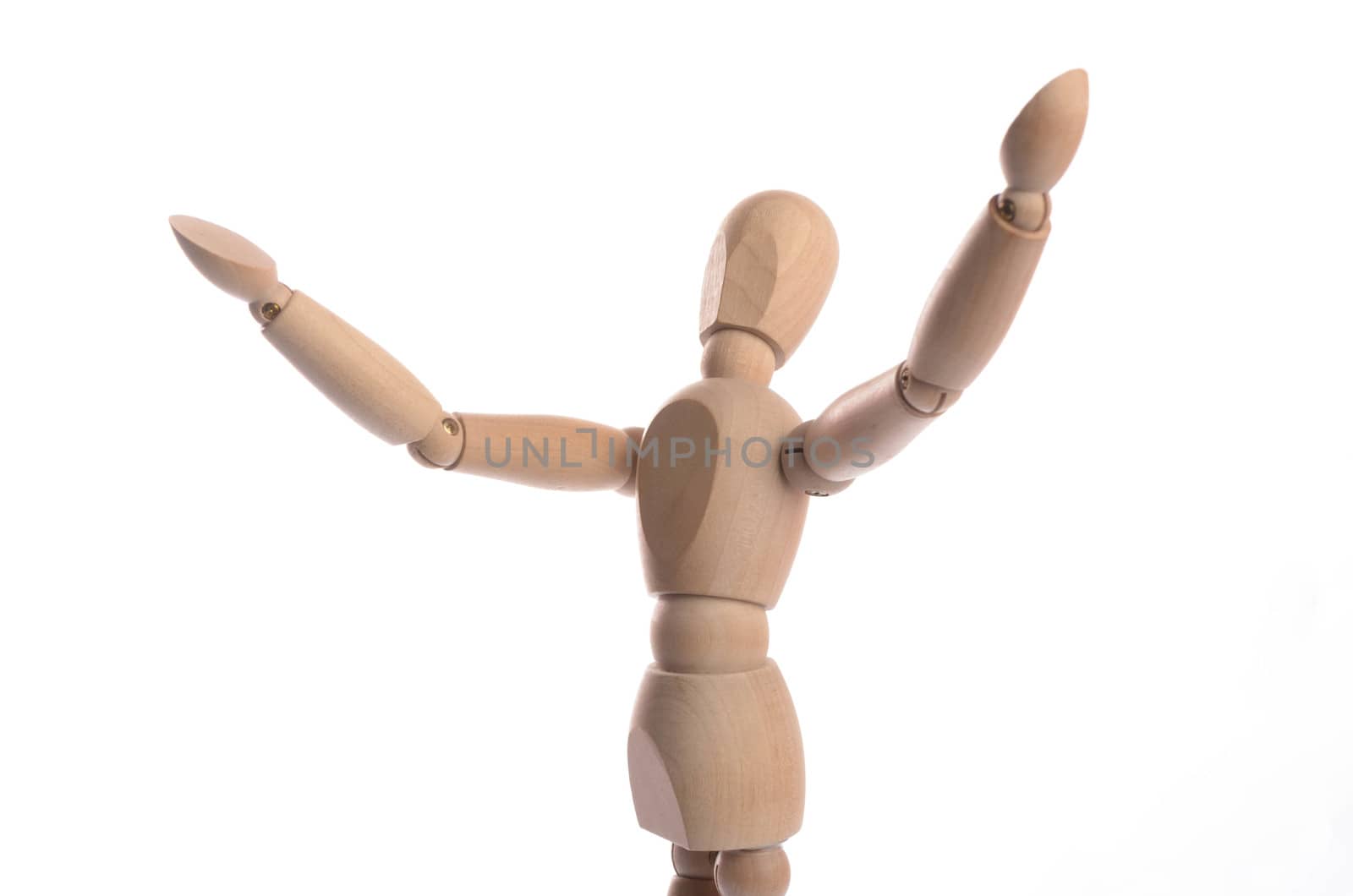 Wooden figure mannequin posing in action isolated on white background.