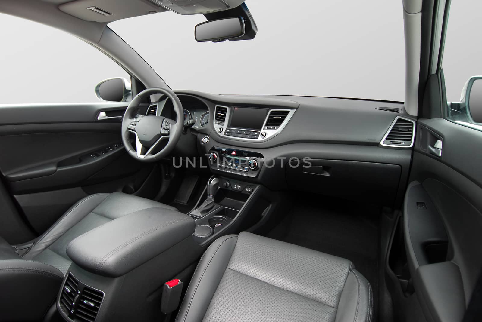 studio shot passenger car interior, front view