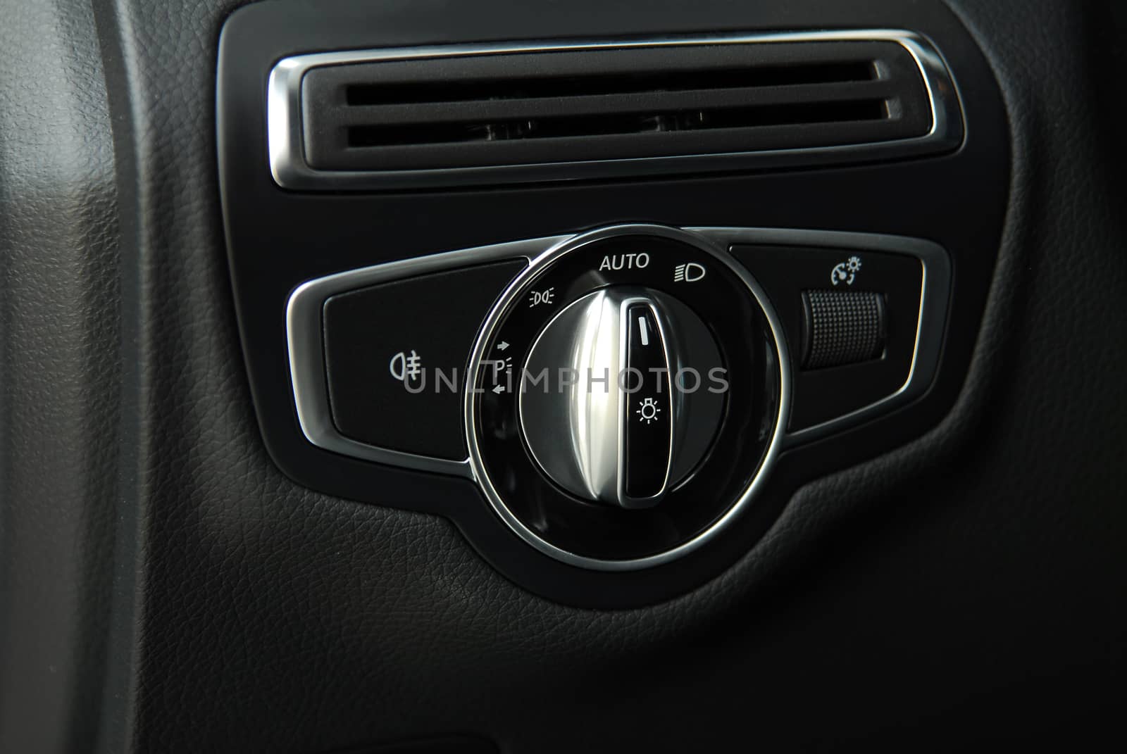 Closeup image of car lighting control switch