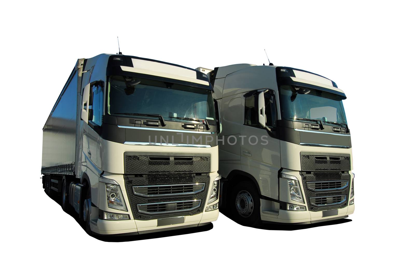 two large trucks with semi trailer on a white background