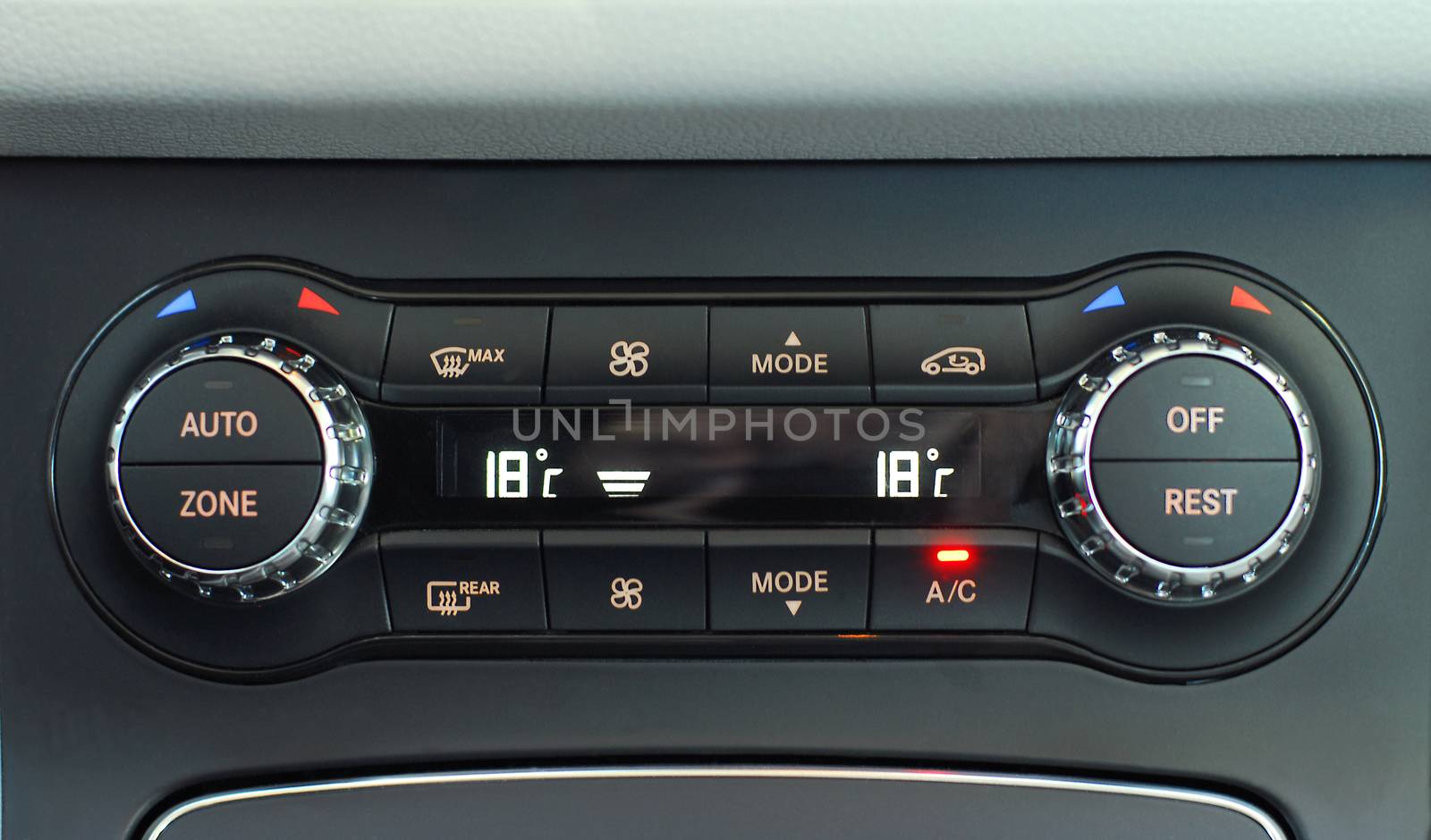 manual switches the air conditioning on the dashboard of the car