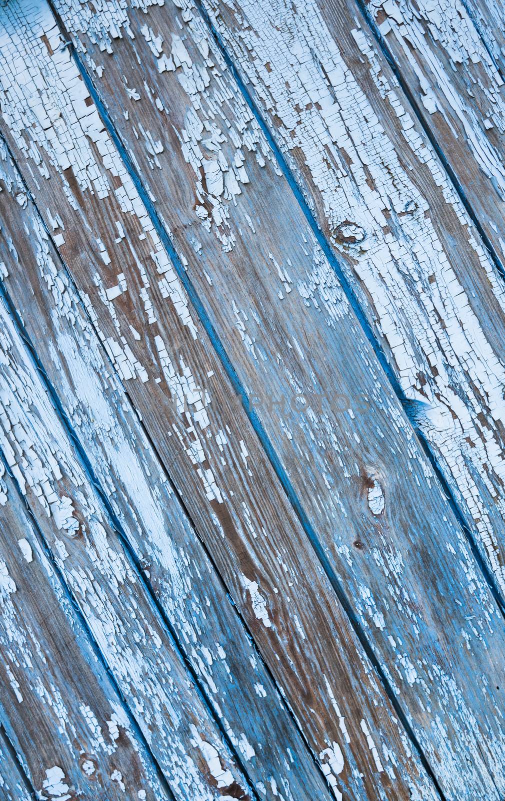 Old painted texture vintage wood background with peeling paint. Painted weathered plain teal blue and white Rustic Wood Board Back ground that can be either horizontal or vertical