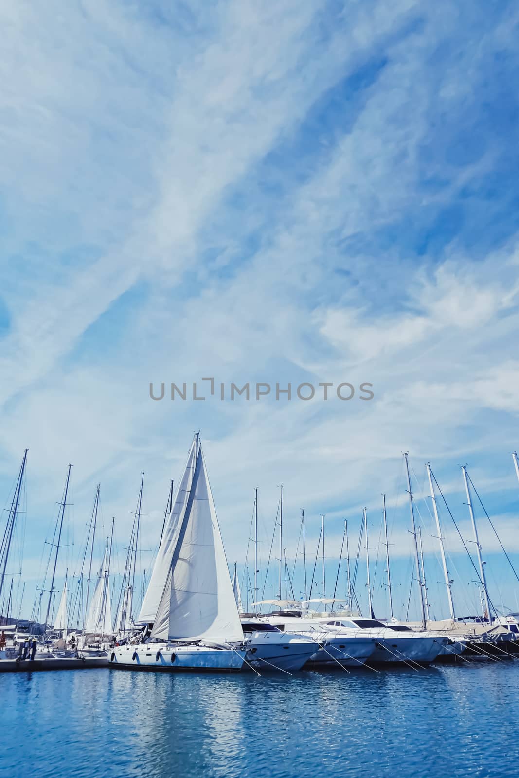 Yachts and boats in the harbor on Mediterranean sea coast, travel and leisure by Anneleven