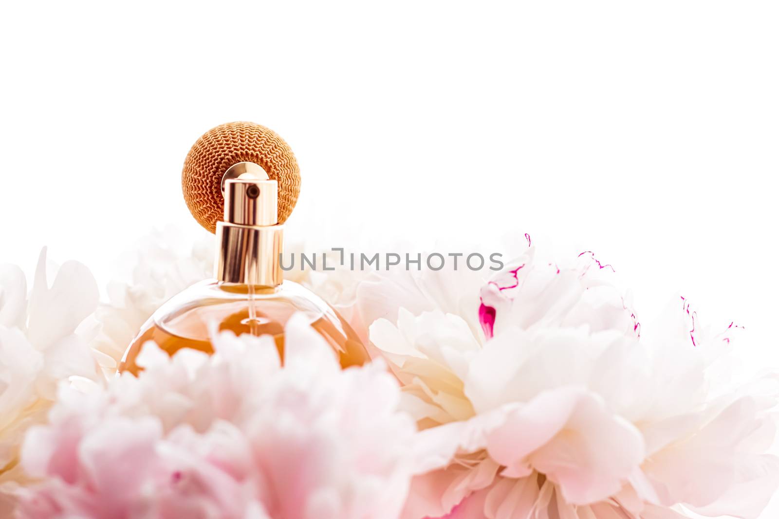 Chic fragrance bottle as citrus perfume product on background of peony flowers, parfum ad and beauty branding by Anneleven