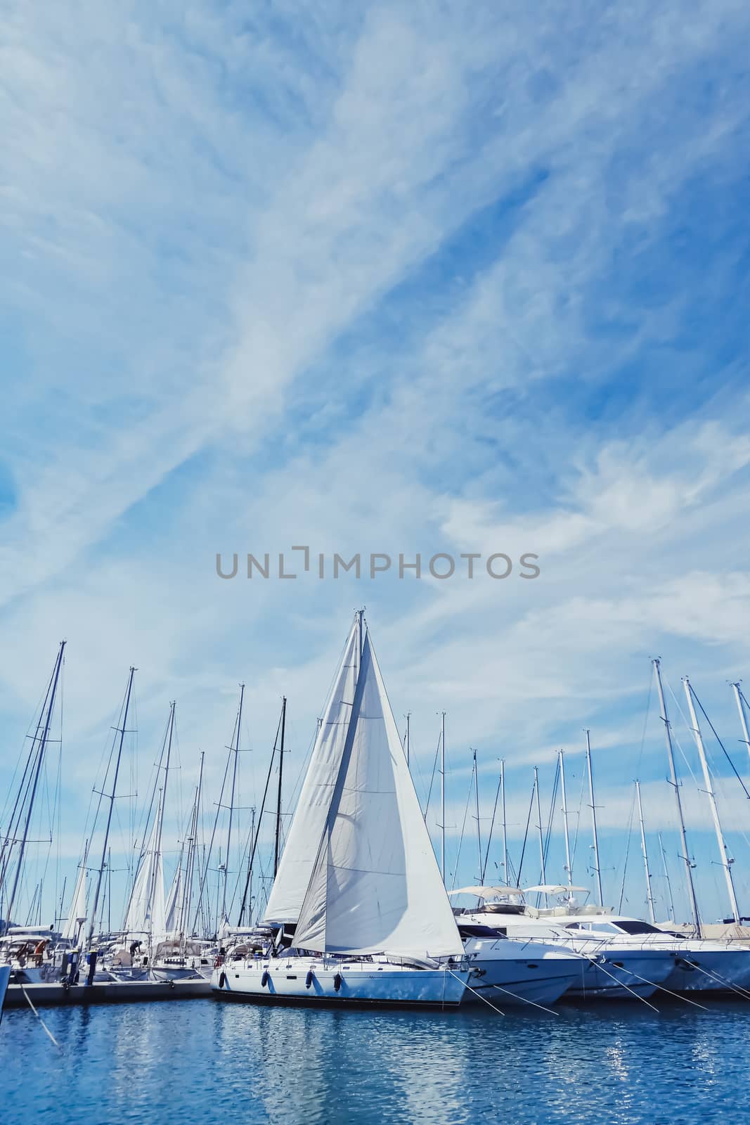 Yachts and boats in the harbor on Mediterranean sea coast, travel and leisure by Anneleven