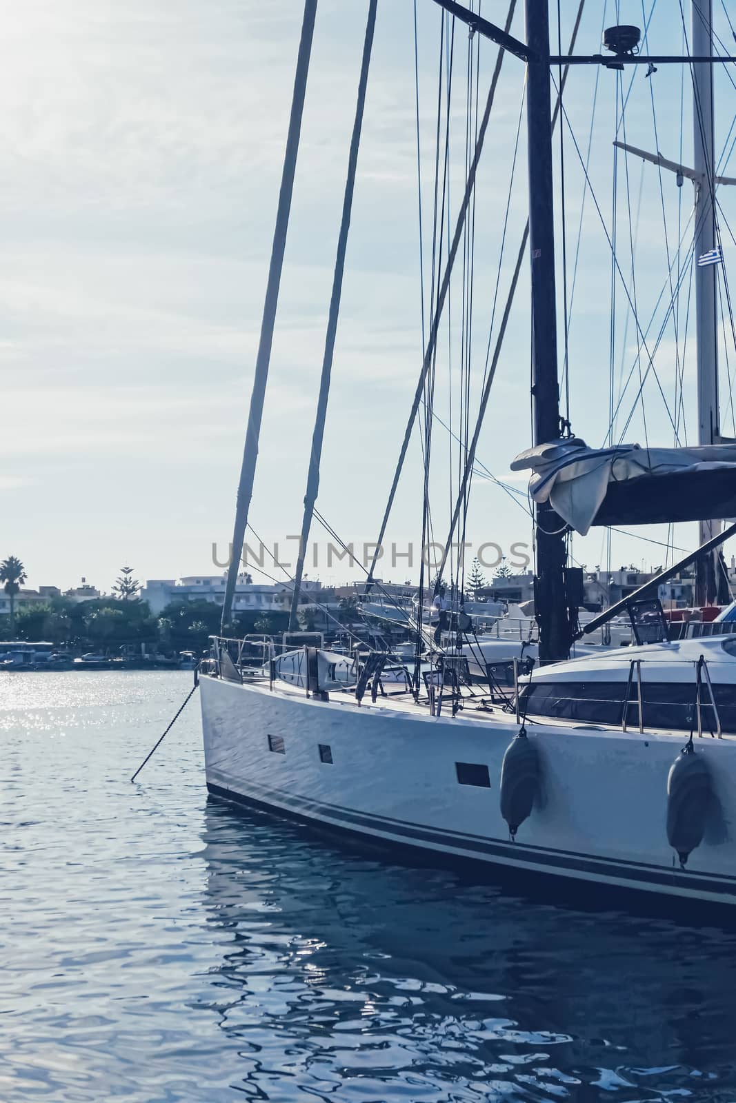 Yachts and boats in the harbor on Mediterranean sea coast, travel and leisure by Anneleven