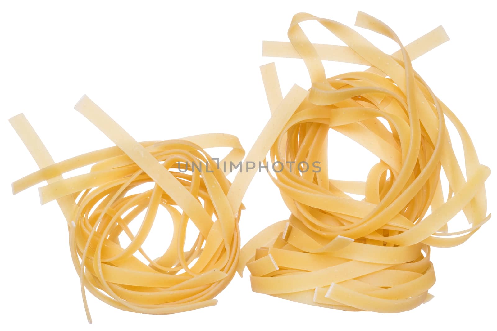 pasta nest close up on a isolated white background.