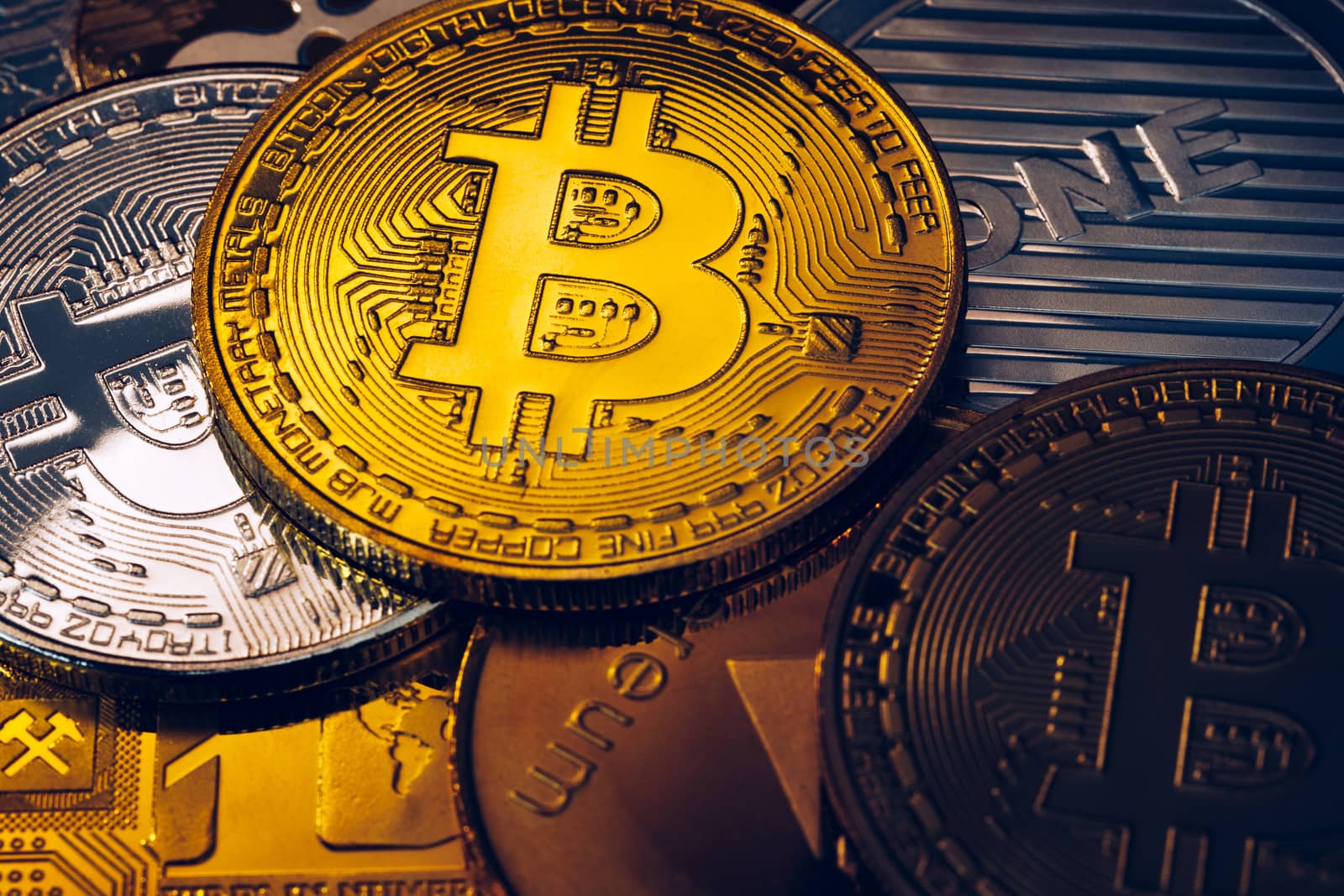 Set of cryptocurrencies with Bitcoin, Etherium, Ripple, Litecoin. Cryptocurrencys new digital money. Bitcoin on the front as the leader. Bitcoin as most important cryptocurrency.