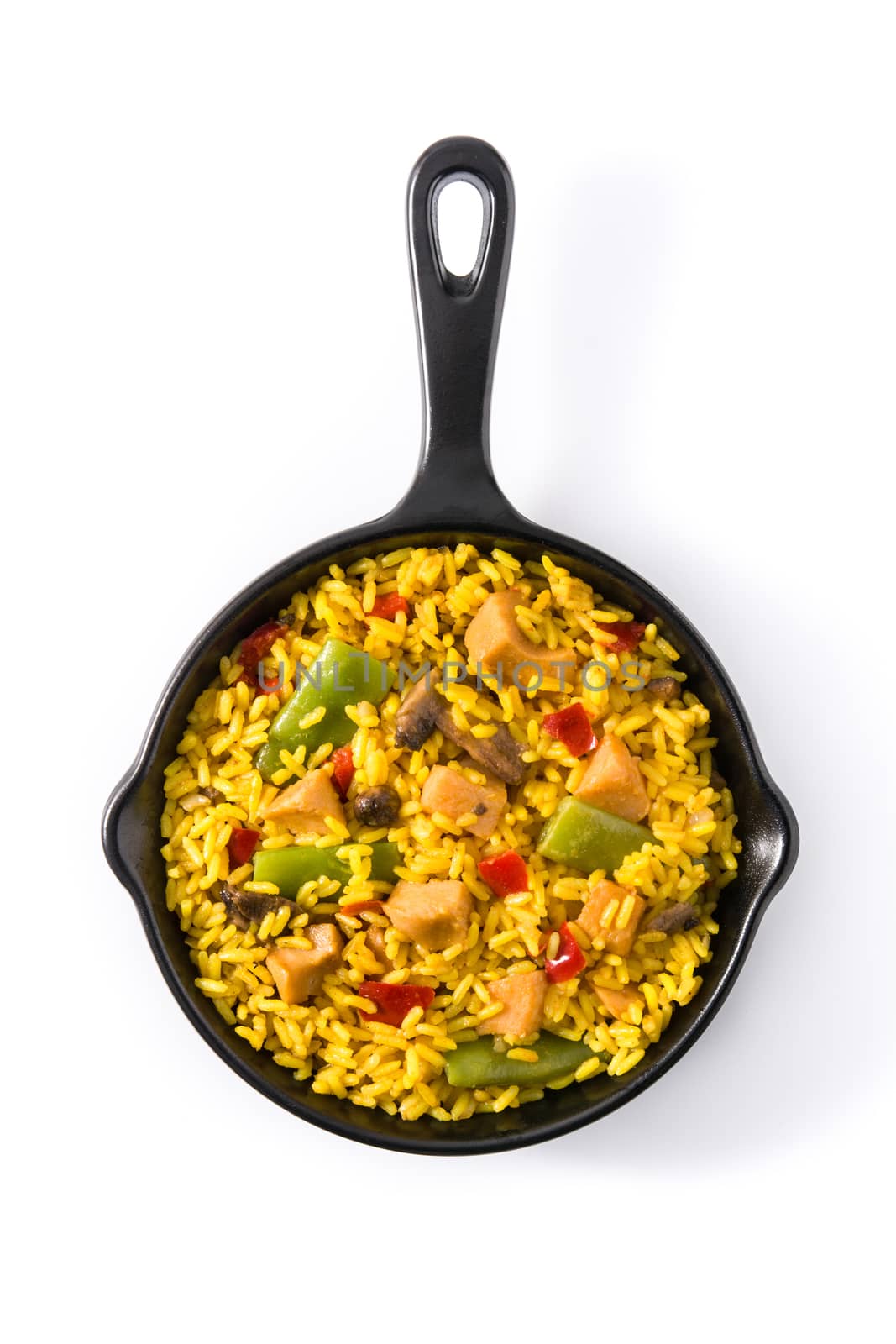 Fried rice with chicken and vegetables in frying pan isolated on white background