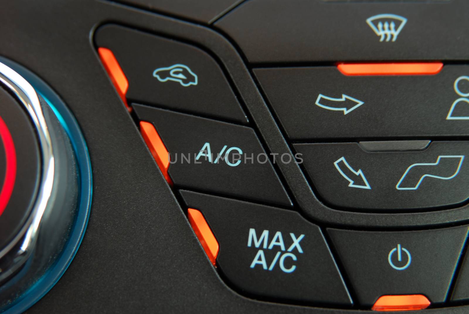 manual switches the air conditioning on the dashboard of the car