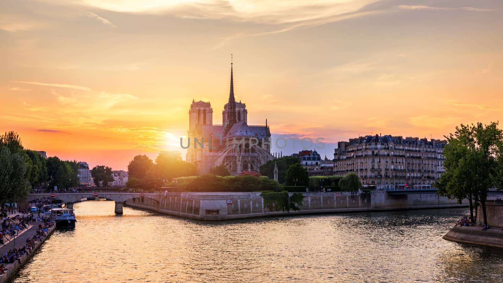 Notre Dame de Paris cathedral at sunset, France. Notre Dame de Paris, most beautiful Cathedral in Paris. Picturesque sunset over Cathedral of Notre Dame de Paris, destroyed in a fire in 2019, Paris.