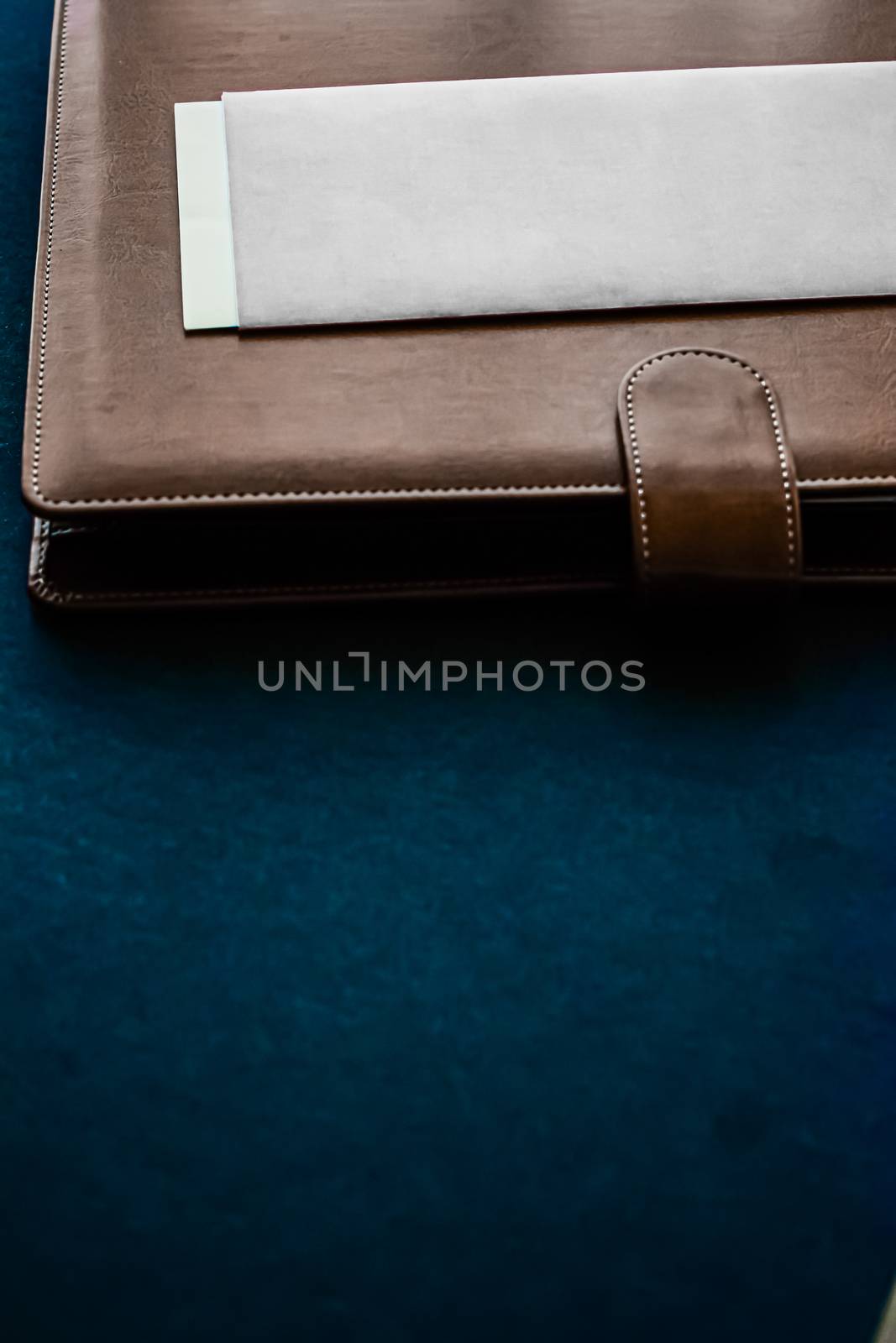 Office desk with briefcase and business card, finance and economy concept