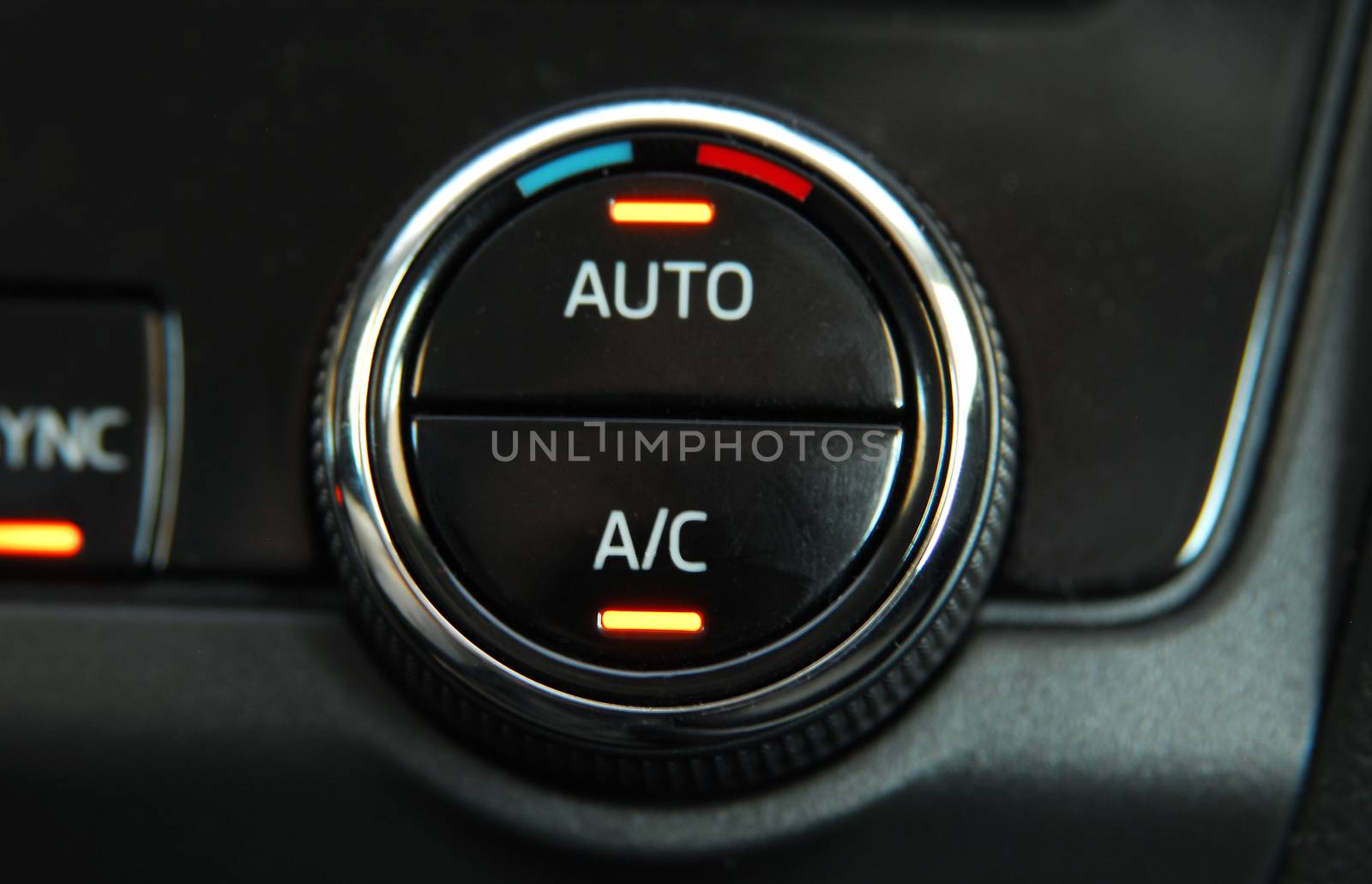 manual switches the air conditioning on the dashboard of the car