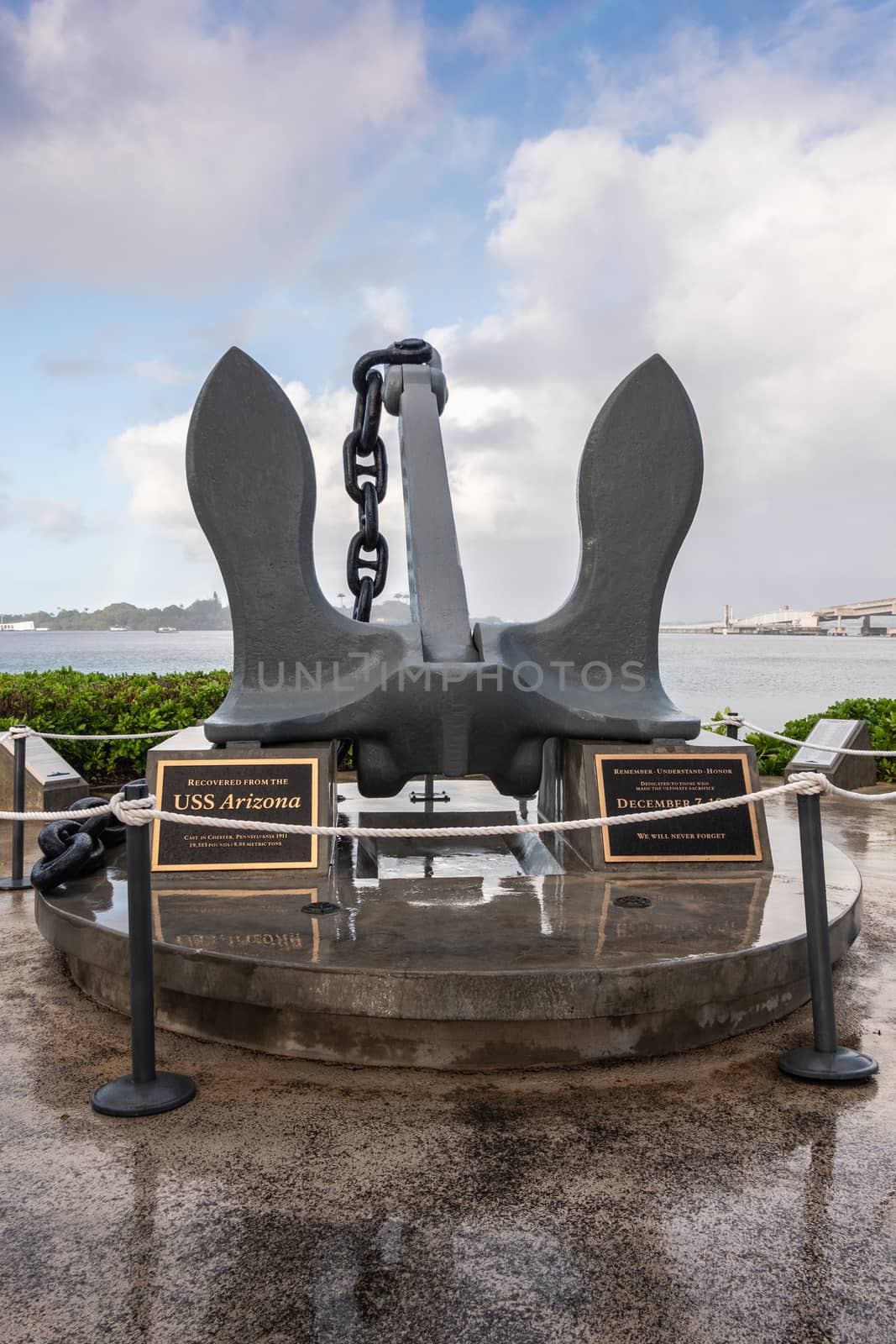 Oahu, Hawaii, USA. - January 10, 2020: Pearl Harbor. USS Arizona anchor on display as statue under blue cloudscape. Wet surface.