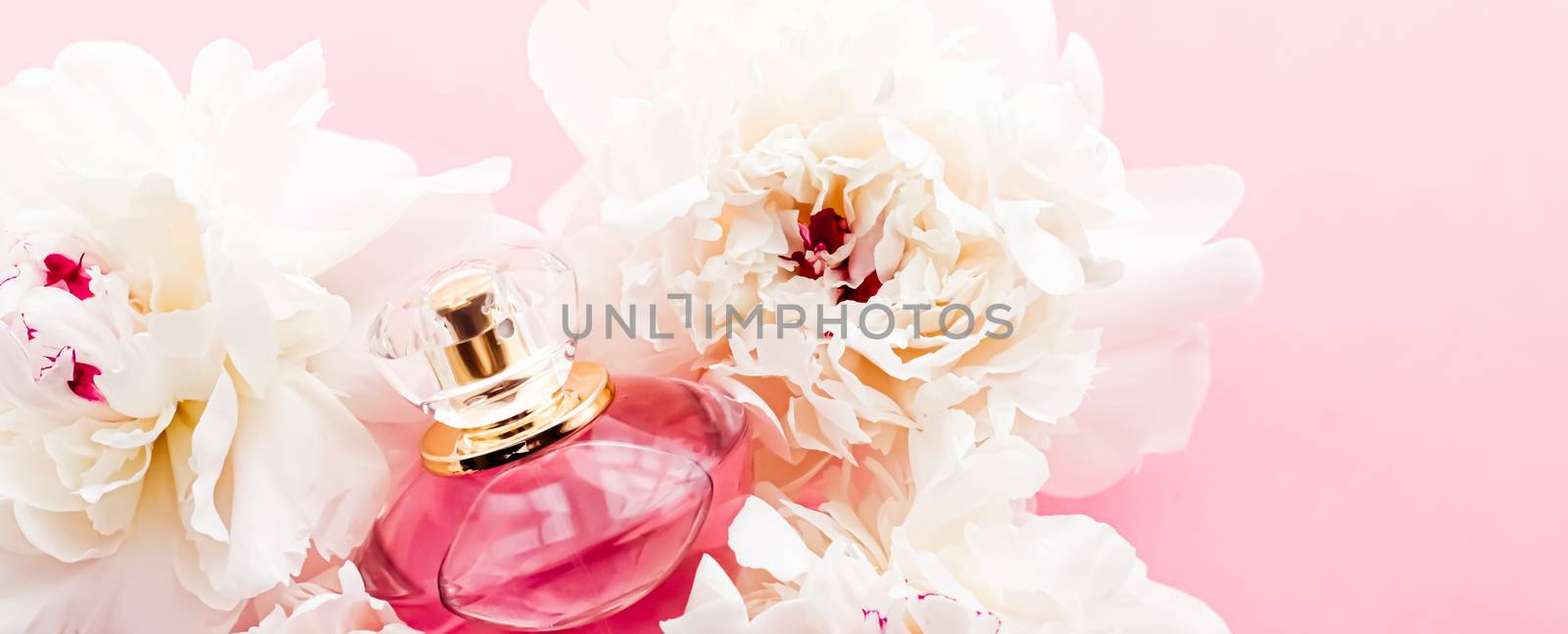 Luxurious fragrance bottle as chic perfume product on background of peony flowers, parfum ad and beauty branding by Anneleven