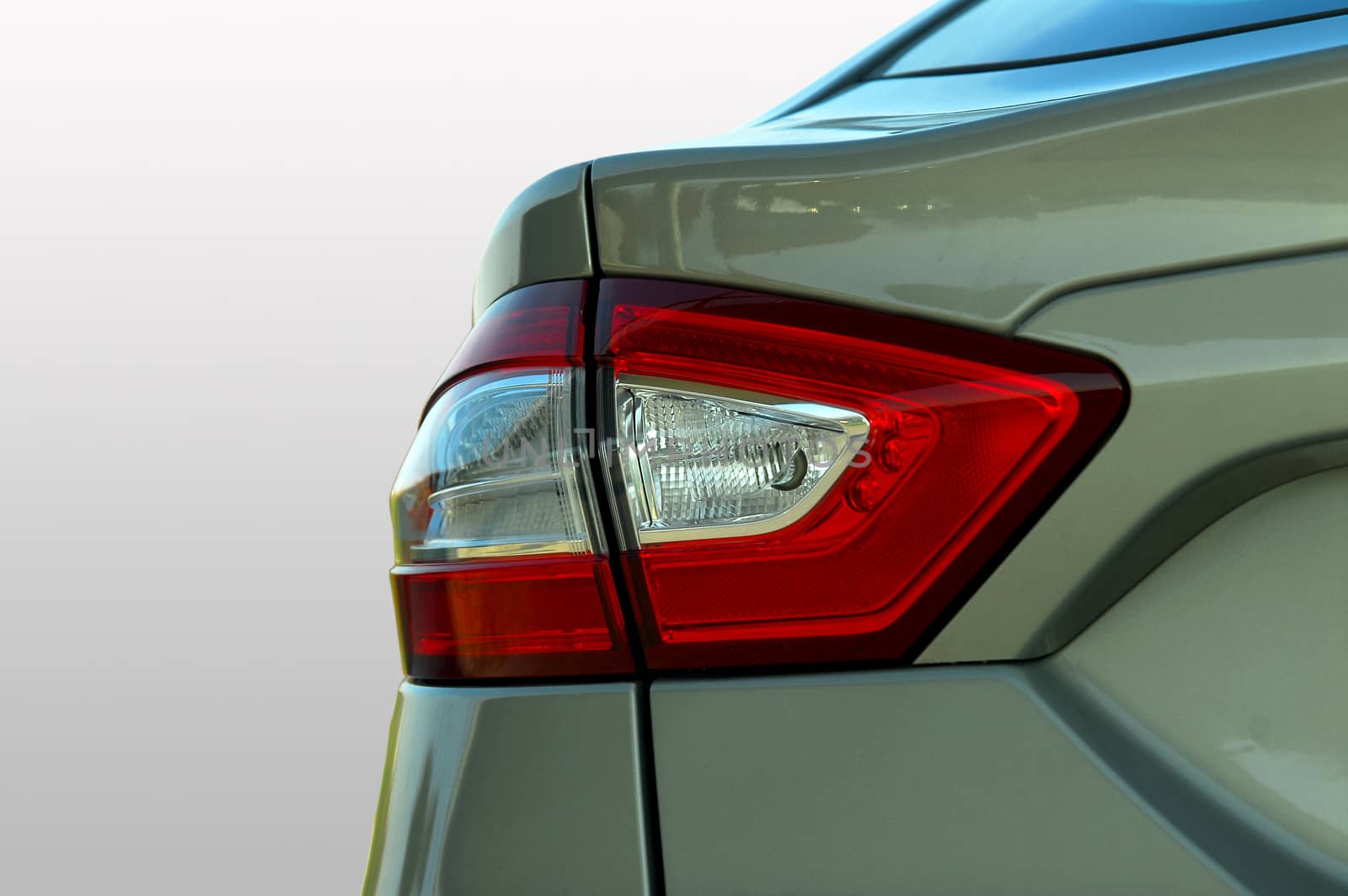 the tail lights on a luxury passenger car