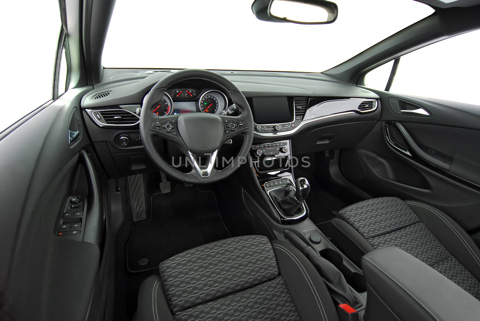 studio shot passenger car interior, front view