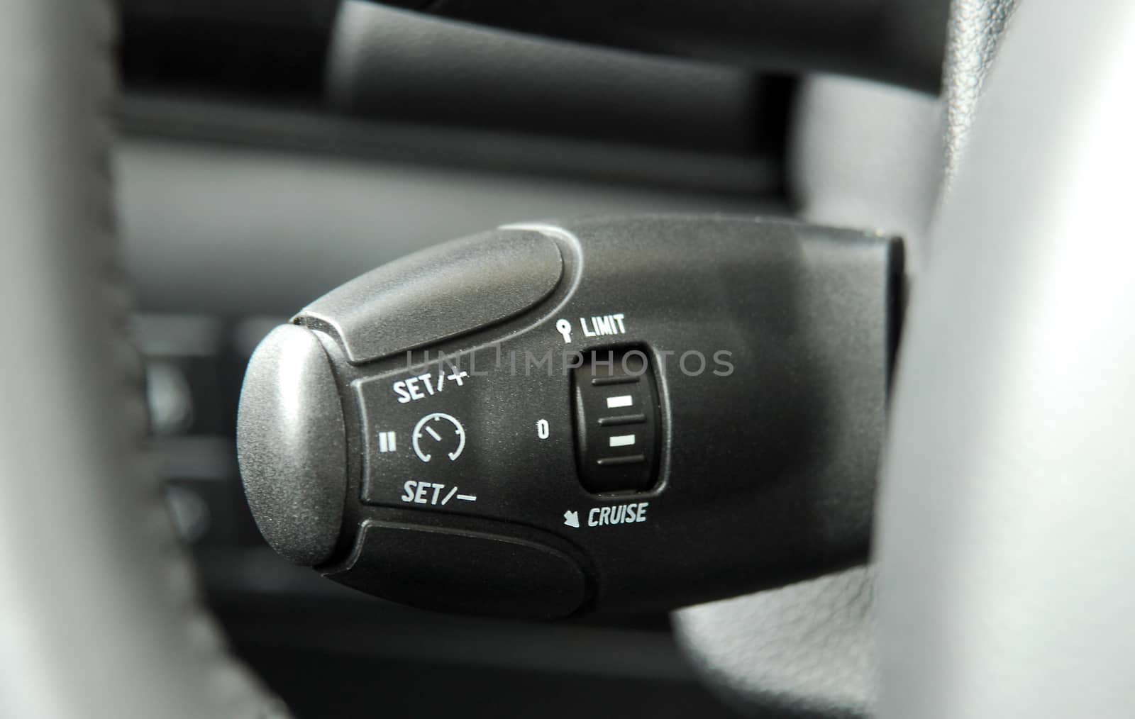 cruise control stick which is located behind the wheel