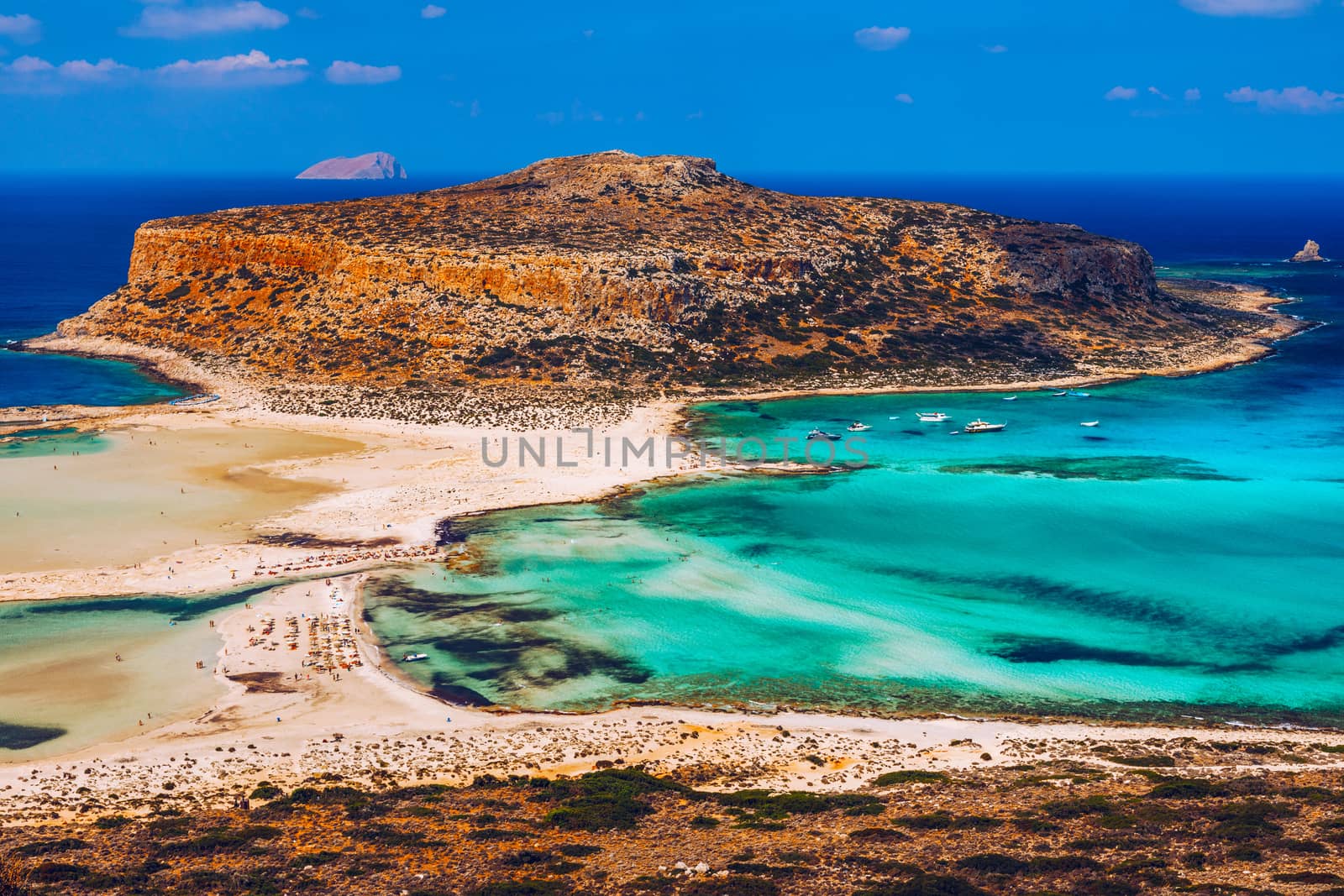 Amazing beach with turquoise water at Balos Lagoon and Gramvousa in Crete, Greece. Cap tigani in the center. Balos beach on Crete island, Greece. Landscape of Balos beach at Crete island in Greece.