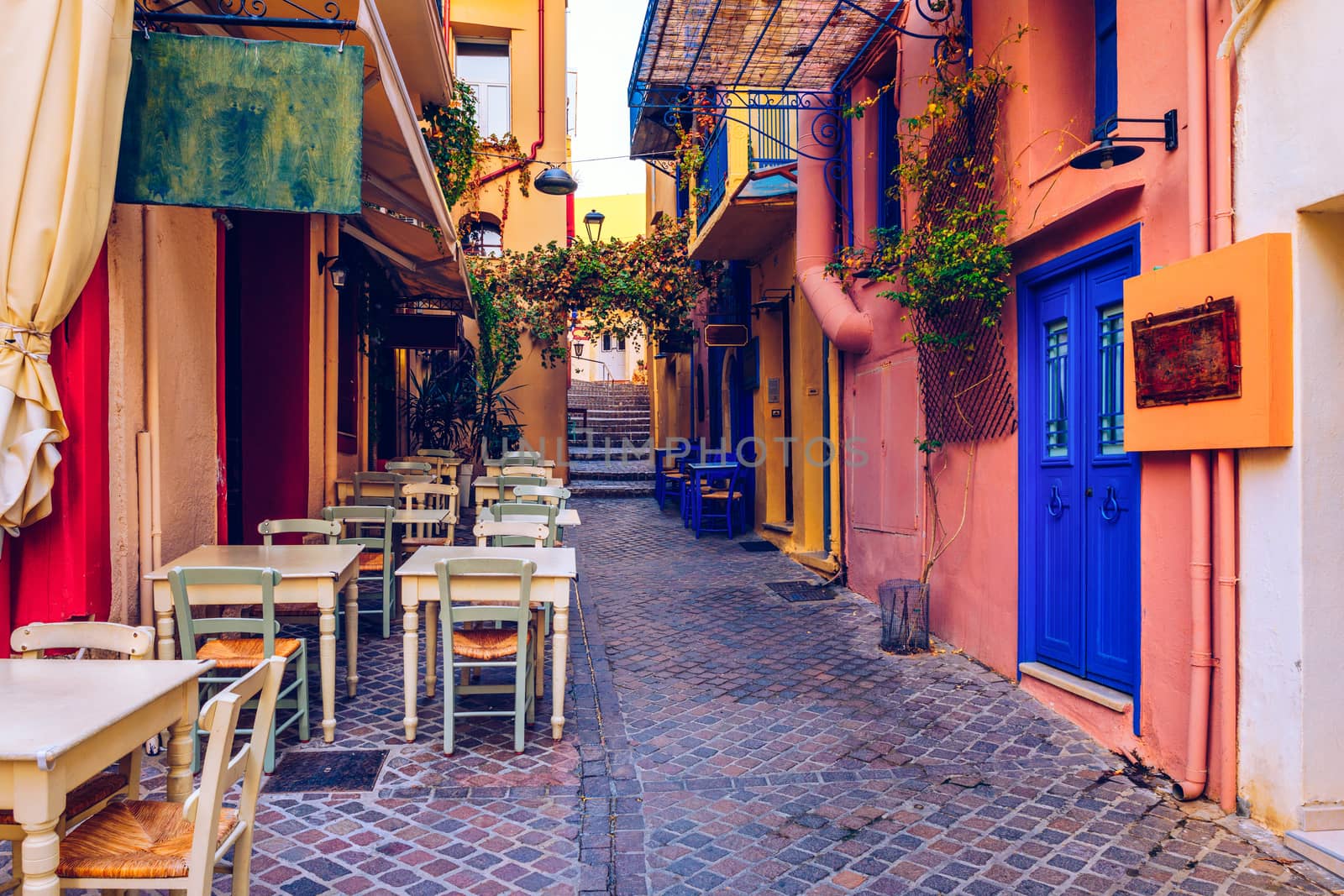 Street in the old town of Chania, Crete, Greece. Charming streets of Greek islands, Crete. Beautiful street in Chania, Crete island, Greece. Summer landscape. Chania old street of Crete island Greece.
