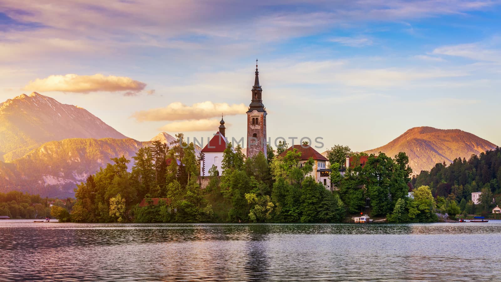 Lake Bled Slovenia. Beautiful mountain lake with small Pilgrimage Church. Most famous Slovenian lake and island Bled with Pilgrimage Church of the Assumption of Maria. Bled, Slovenia, Europe. 