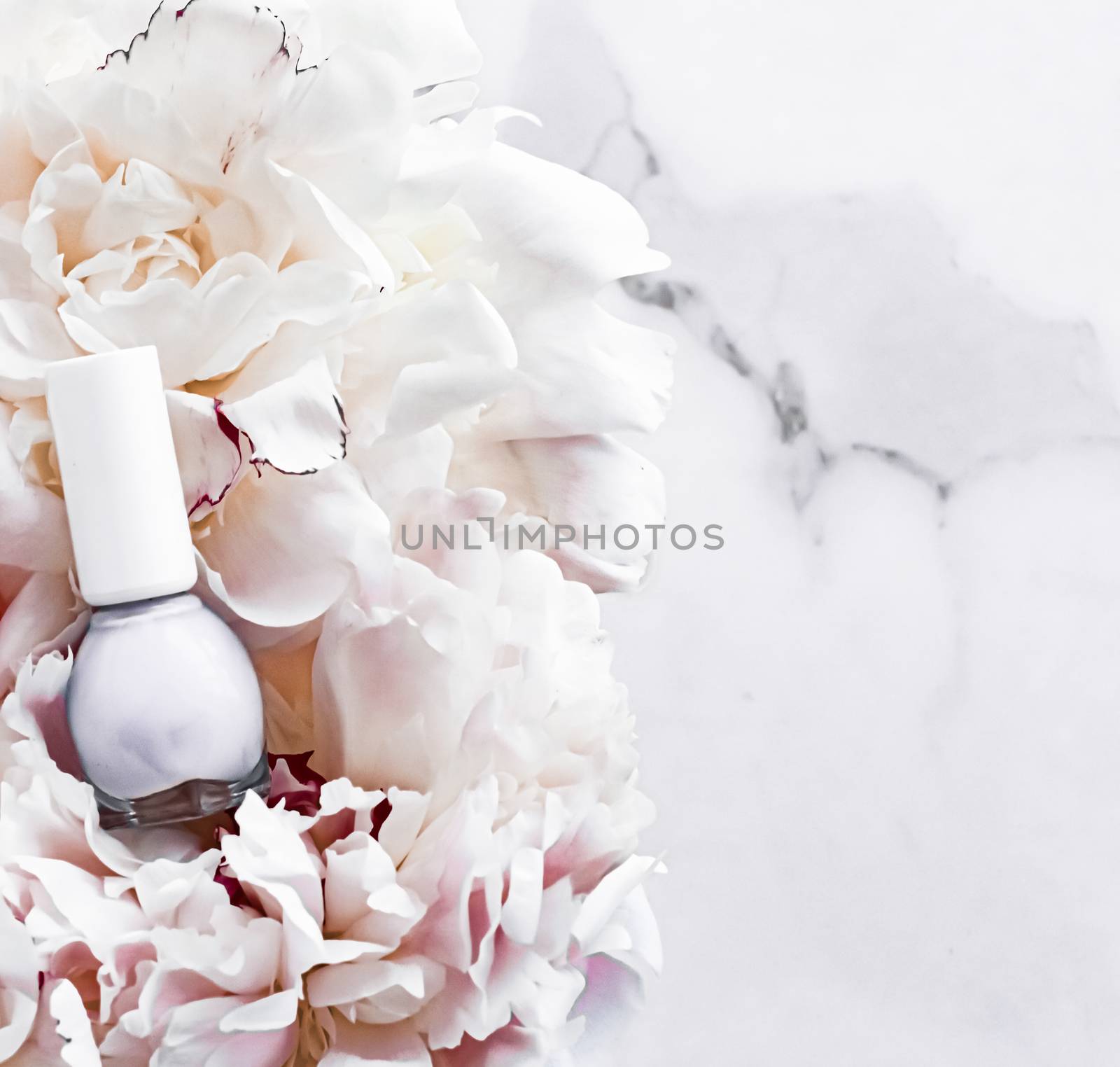 Nail polish bottles on floral background, french manicure and cosmetic branding by Anneleven
