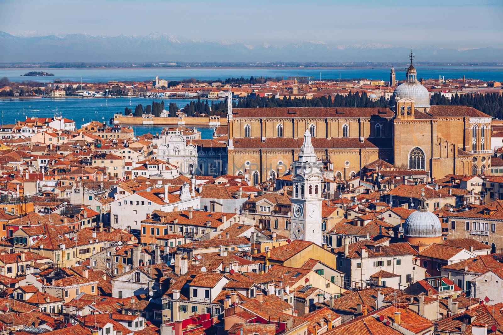 Venice panoramic aerial view with red roofs, Veneto, Italy. Aerial view with dense medieval red roofs of Venice, Italy 