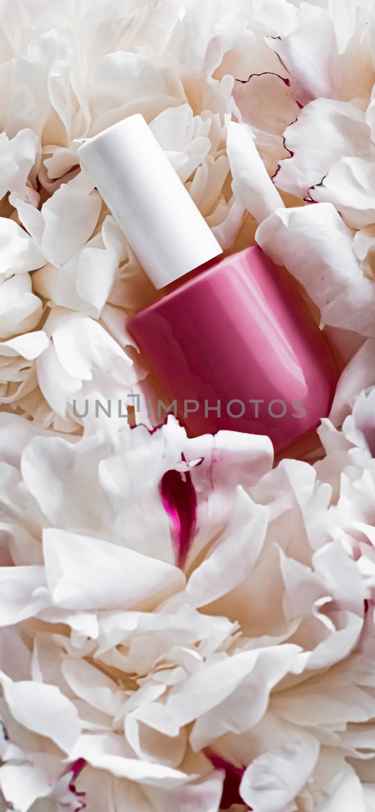 Nail polish bottles on floral background, french manicure and cosmetic branding by Anneleven