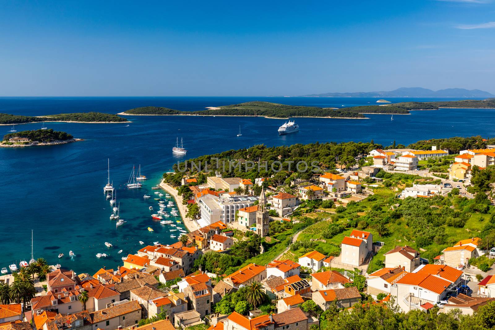 View at amazing archipelago in front of town Hvar, Croatia. Harbor of old Adriatic island town Hvar. Popular touristic destination of Croatia. Amazing Hvar city on Hvar island, Croatia.