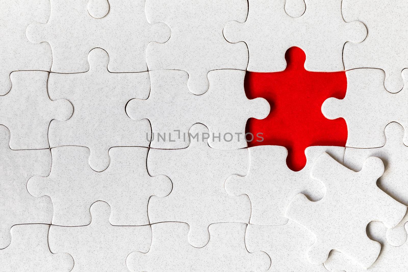 Jigsaw puzzle with missing piece. Missing puzzle pieces. Concept image of unfinished task. Completing final task, missing jigsaw puzzle pieces and business concept with a puzzle piece missing.