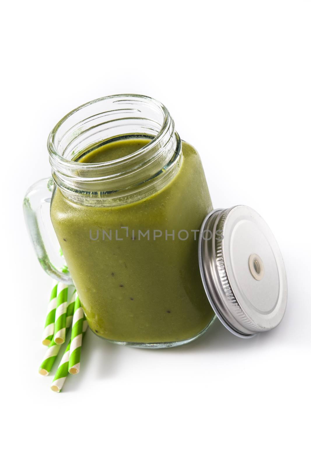 Healthy green smoothie with spinach,mint, kiwi, ginger and green isolated on white background