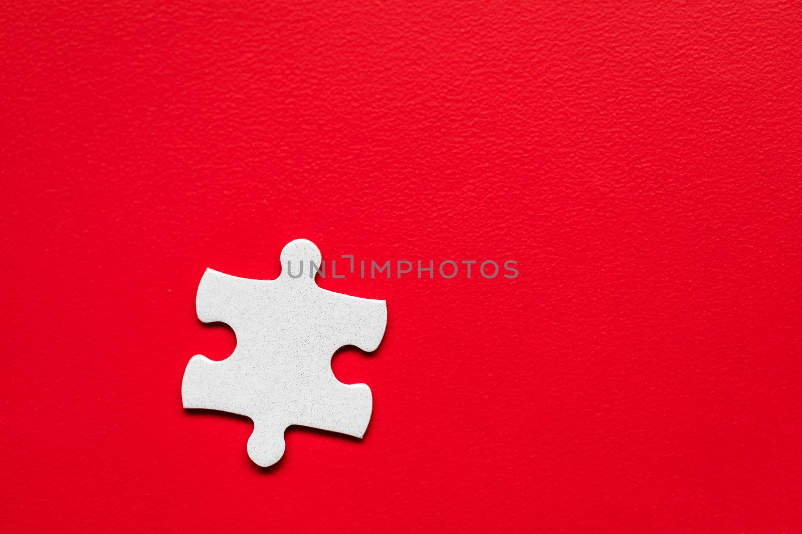 Closeup of jigsaw puzzle isolated. Missing jigsaw puzzle piece, business concept for completing the puzzle piece. Group of puzzle and a puzzle piece. Teamwork concept. Think difference concept. 