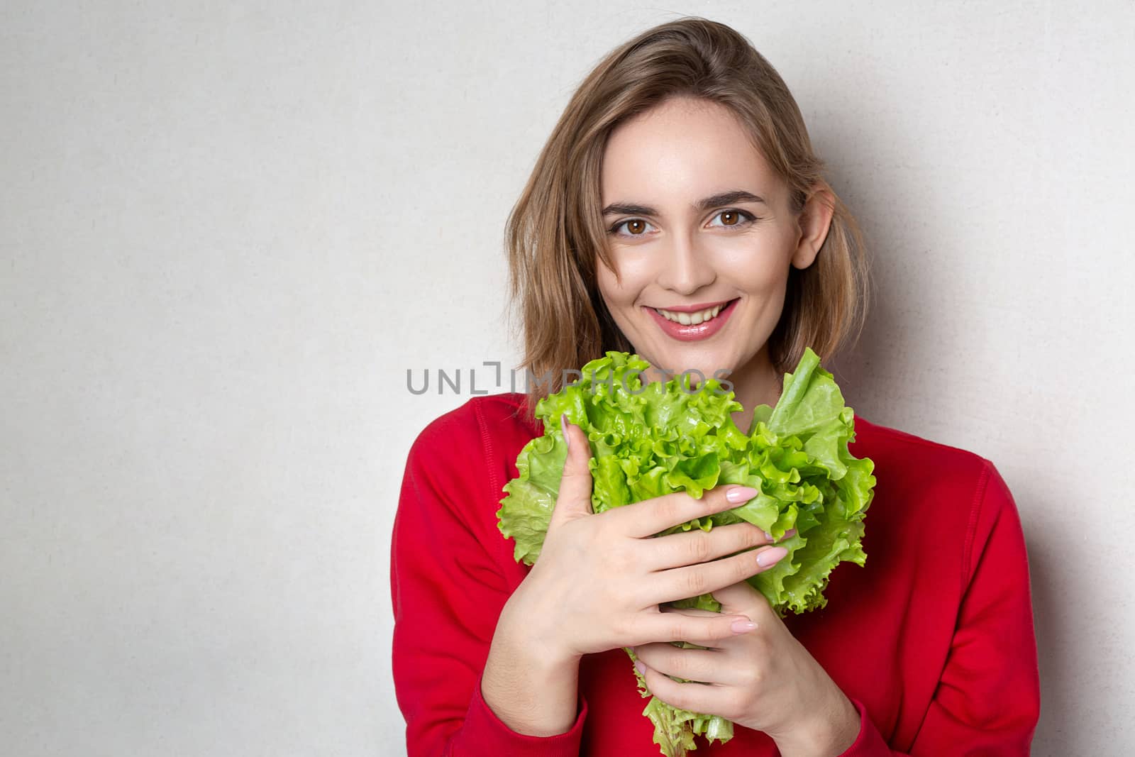 Gorgeous girl holding lettuce  by ViktoriiaPav