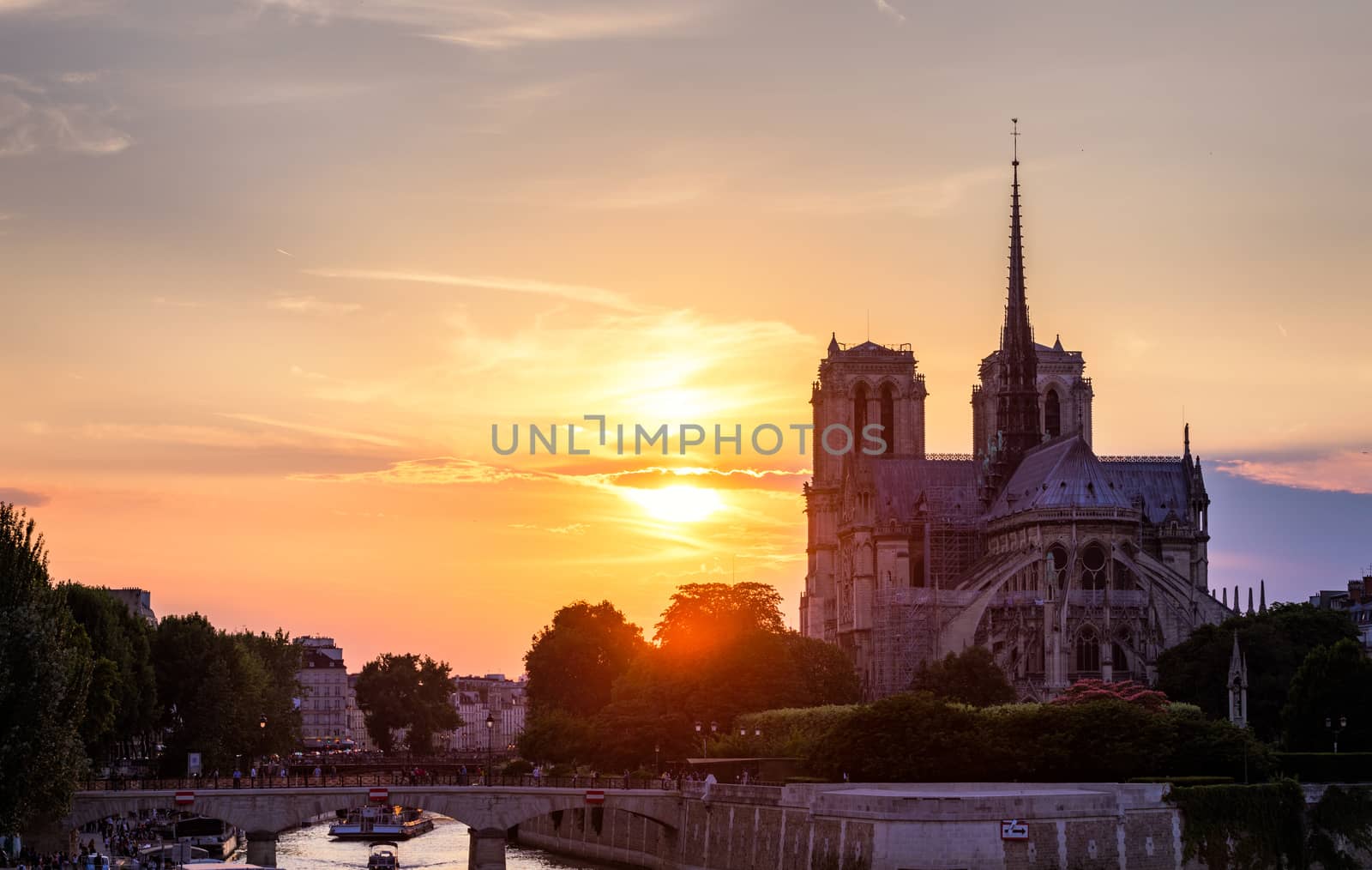 Notre Dame de Paris cathedral, France. Notre Dame de Paris Cathedral, most beautiful Cathedral in Paris. Picturesque sunset over Cathedral of Notre Dame de Paris, destroyed in a fire in 2019, Paris.