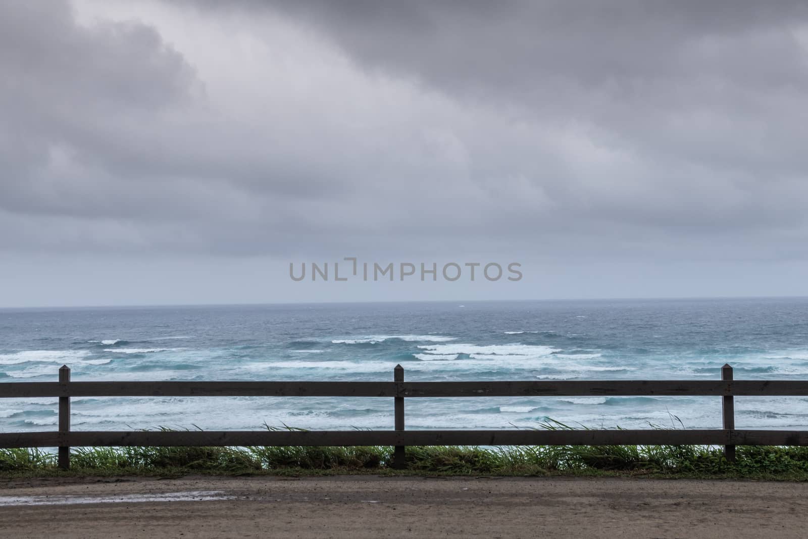 Pacific Ocean surf under rainy clouds off east coast, Oahu, Hawa by Claudine