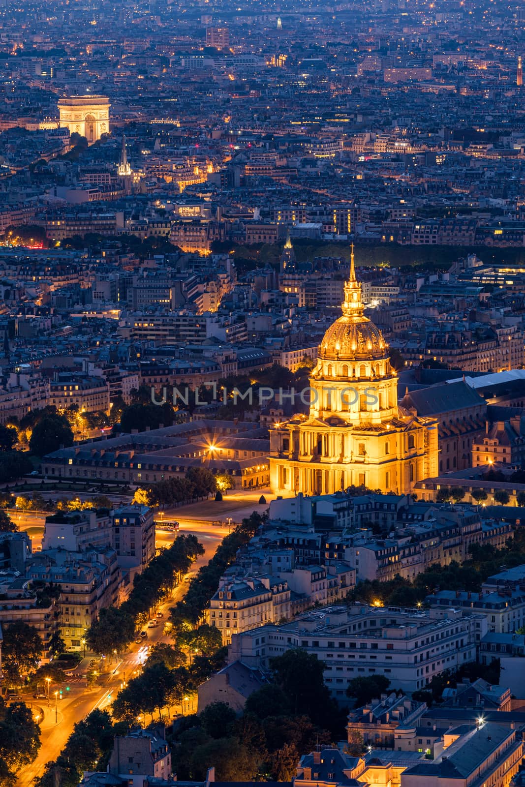 Paris aerial with Les Invalides, France. Twilight aerial view of Paris, France from Montparnasse Tower with Les Invalides building and Arc de Triomphe. Beautiful Les Invalides in Paris, France