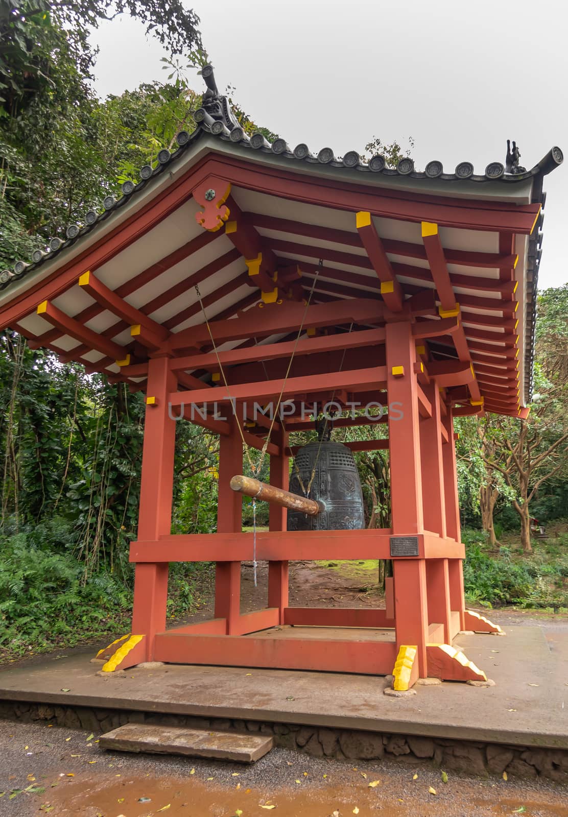 Sacred bell pavilion outside Byodo-in Buddhist temple in Kaneohe by Claudine