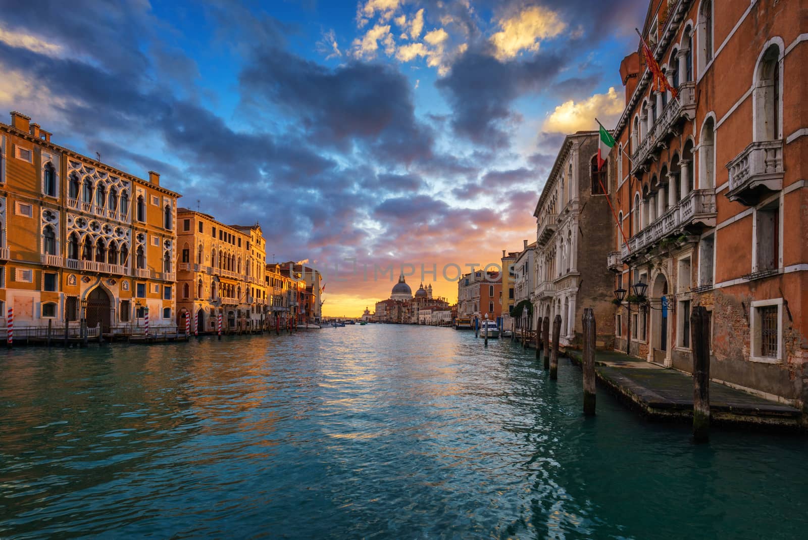 Grand Canal at sunrise in Venice, Italy. Sunrise view of Venice Grand Canal. Architecture and landmarks of Venice. Venice postcard