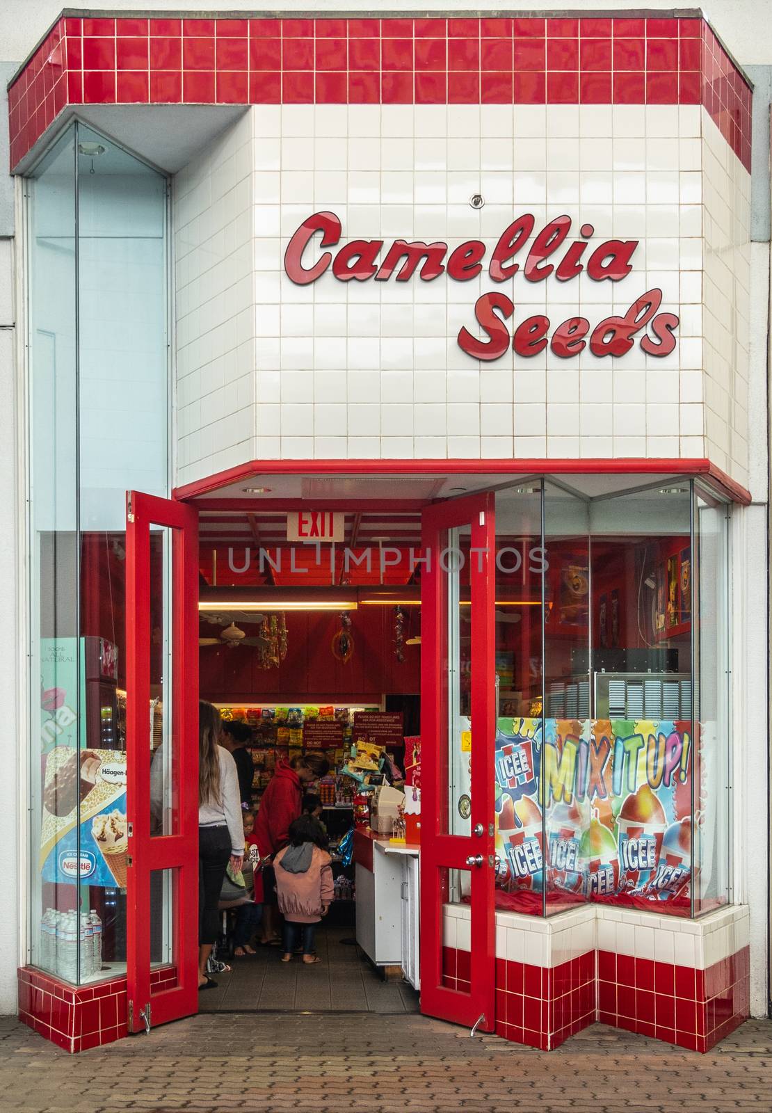 Kahului, Maui,, Hawaii, USA. - January 12, 2020: Camellia seeds store at Queen Kaahumanu shopping center. Red letters on white. People in store.