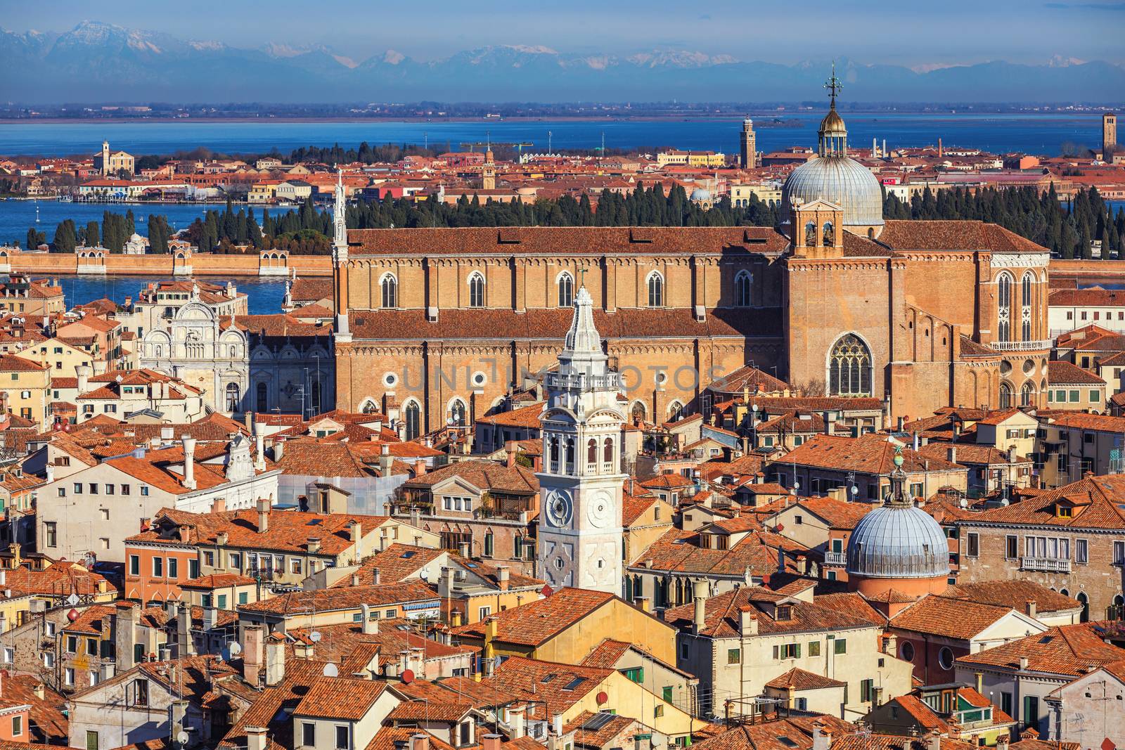 Venice panoramic aerial view with red roofs, Veneto, Italy. Aerial view with dense medieval red roofs of Venice, Italy 