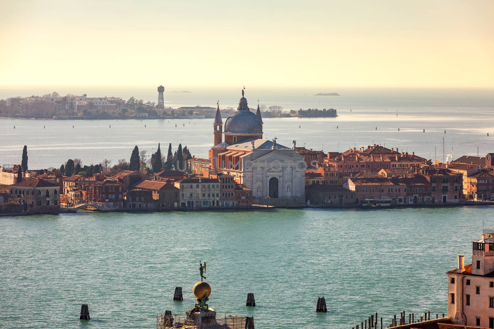 Venice panoramic aerial view with red roofs, Veneto, Italy. Aerial view with dense medieval red roofs of Venice, Italy 