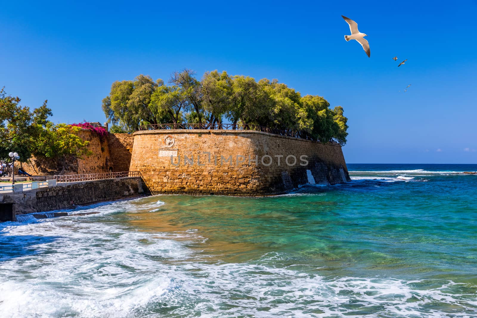 Picturesque old port of Chania. Landmarks of Crete island. Greece. Bay of Chania at sunny summer day, Crete Greece. View of the old port of Chania, Crete, Greece. The port of chania, or Hania. 