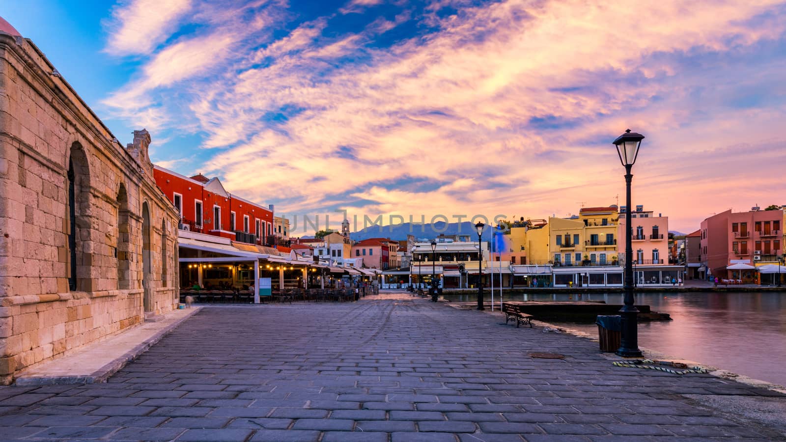 Picturesque old port of Chania. Landmarks of Crete island. Greece. Bay of Chania at sunny summer day, Crete Greece. View of the old port of Chania, Crete, Greece. The port of chania, or Hania. 